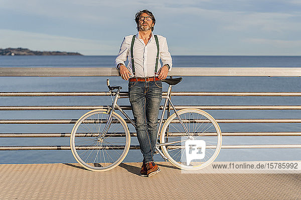 Man with fixie on a jetty