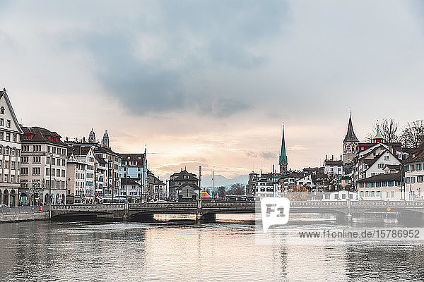 Switzerland  Zurich  City with Limmat river  houses on riverfront and bell towers in background