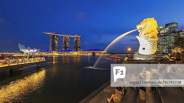 Merlion fountain and Marina Bay Sands at night Singapore Republic of Singapore.