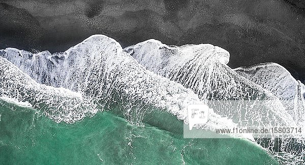 Waves on the beach  turquoise sea and black sand beach  aerial view  west coast  south island  New Zealand  Oceania