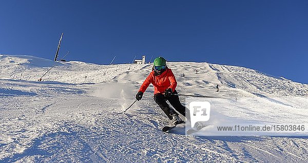 Skier descending a steep slope  black piste  Hohe Salve  SkiWelt Wilder Kaiser  Brixen im Thale  Tyrol  Austria  Europe
