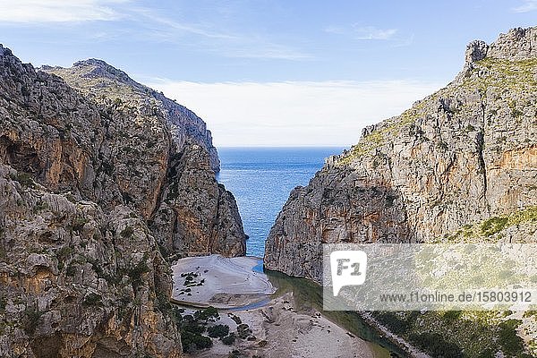 End of the gorge Torrent de Pareis at the sea  near Sa Calobra  Serra de Tramuntana  drone recording  Majorca  Balearic Islands  Spain  Europe