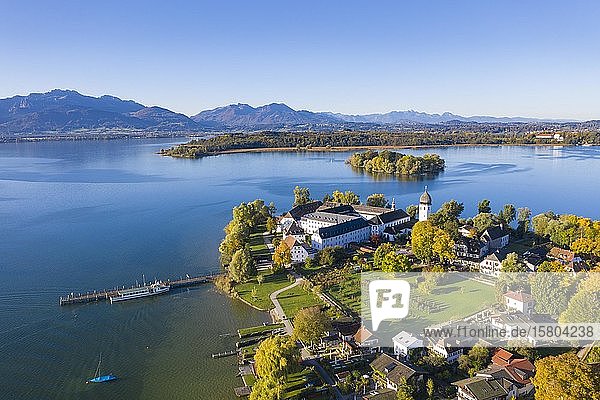 Steam jetty and Benedictine monastery Frauenwörth on Fraueninsel  Frauenchiemsee  behind Krautinsel and Herreninsel  Chiemsee  Alps  Chiemgau  aerial view  foothills of the Alps  Upper Bavaria  Bavaria  Germany  Europe