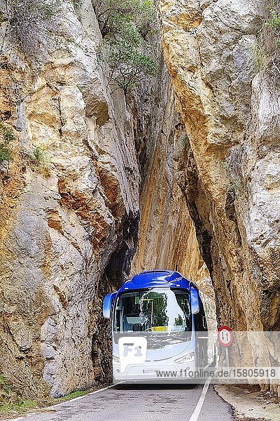 Coach in the rock gate sa Bretxa  mountain road MA-2141  Sa Calobra  Serra de Tramuntana  Majorca  Balearic Islands  Spain  Europe