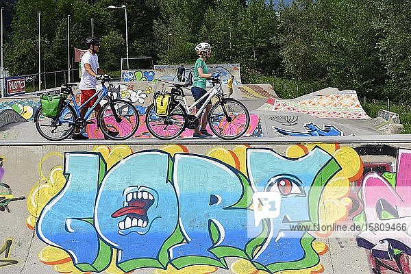 Cyclists at the Skaterpark am Innradweg Wörgl Kitzbühel Alps Tyrol Austria Europe