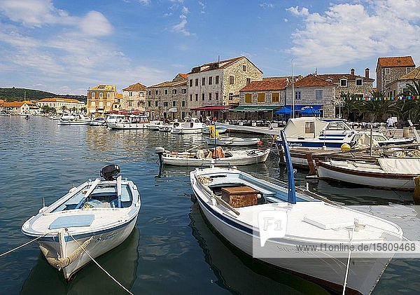 Promenade with fishing boats in the port  Stari Grad  island of Hvar  Dalmatia  Croatian Adriatic coast  Croatia  Europe
