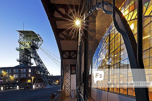Illuminated machine hall with winding tower in the evening  Zollern Colliery  Dortmund  Ruhr Area  North Rhine-Westphalia  Germany  Europe