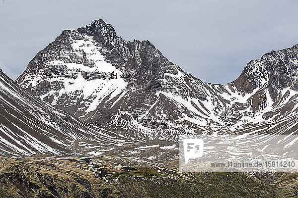 Fresh dusting of snow on the mountains surrounding Godthul South Georgia UK Overseas Protectorate Polar Regions