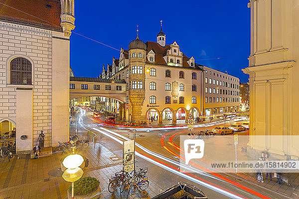 View of trail lights on street near Old Town Hall at dusk  Munich  Bavaria  Germany  Europe
