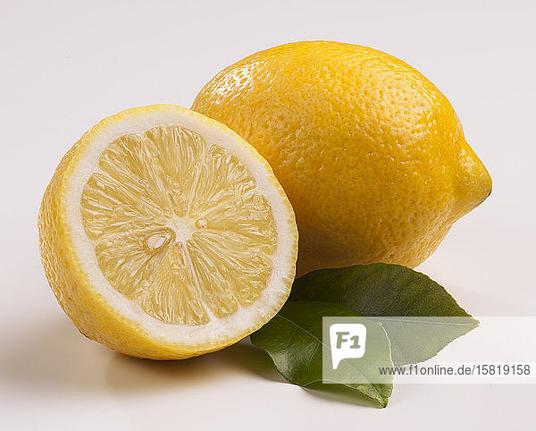 Lemon  lemon half and lemon leaves