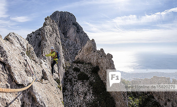 Woman mountaineering at Bernia Ridge  Costa Blanca  Alicante  Spain