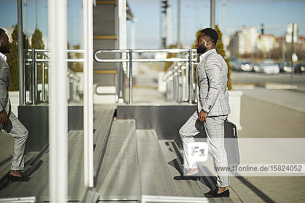 Businessman entering hotel