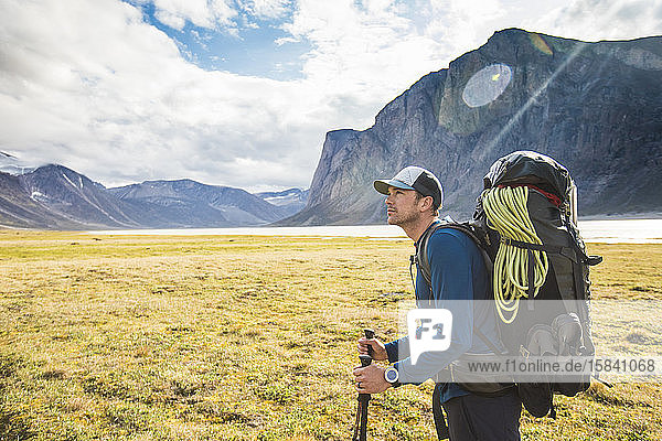 Portrait of backpacker during muti-day hike in Akshayak Pass