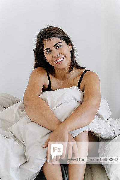 Beautiful Young Woman In Bed