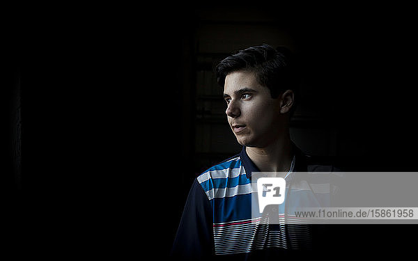 Portrait of Teen Boy Looking to Side