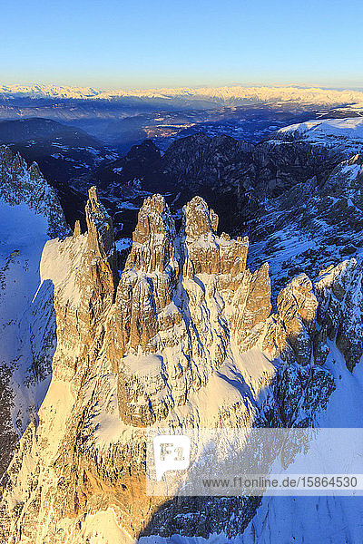 Aerial view of Catinaccio Group and Vajolet Towers at sunset Sciliar Natural Park Dolomites Trentino-Alto Adige Italy Europe