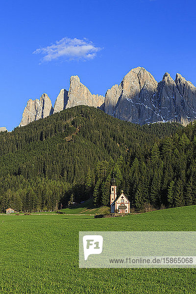 The Church of Ranui and the Odle group in the background St. Magdalena Funes Valley Dolomites South Tyrol Italy Europe