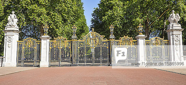 Ornate and decorative gates to Buckingham Palace; London England