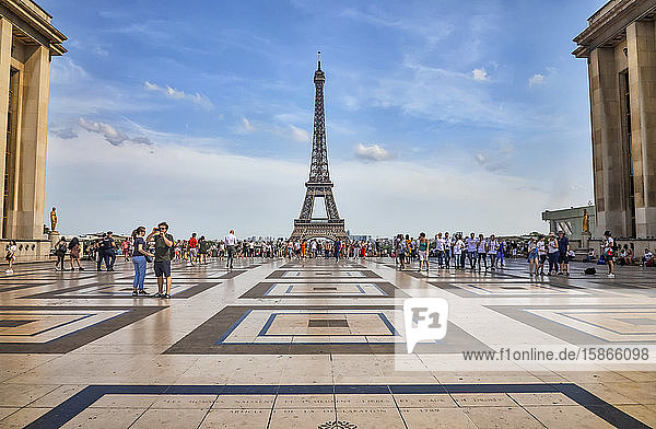 Tourists in the Palais de Chaillot and a view of the Eiffel Tower; Paris France