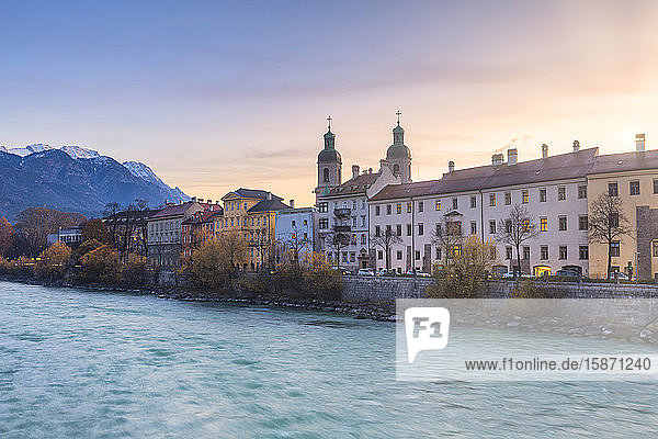 Cathedral of St. James and Inn River at sunrise Innsbruck Tyrol Austria Europe