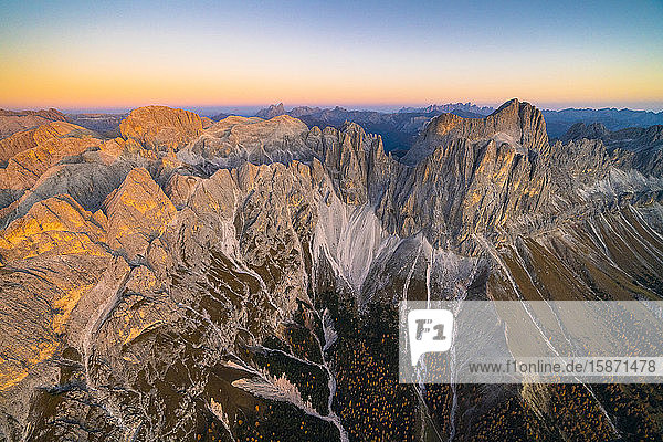 Aerial view of autumn sunset over Torri Del Vajolet Catinaccio Group and Roda di Vael Dolomites South Tyrol Italy Europe