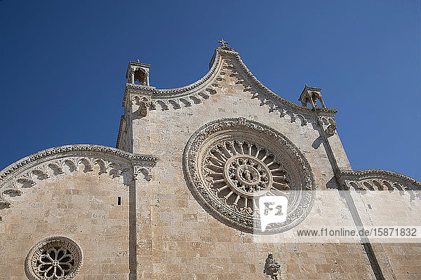 The rose window on the Cathedral of Santa Maria dell Assunzione in Ostuni Puglia Italy Europe