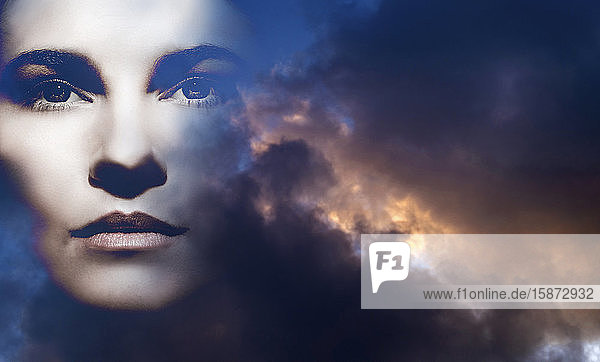 Double exposure of woman and overcast sky