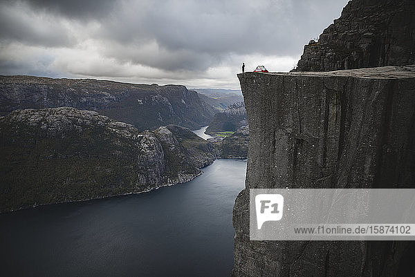 Person and tent on Preikestolen cliff in Rogaland  Norway