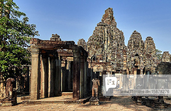The magnificent Bayon Temple situated within the last capital city of the Khmer Empire - Angkor Thom. Its 54 gothic towers are decorated with 216 enormous smiling faces. Built in the late 12th or early 13th century as the official state temple of the King Jayavarman VII.