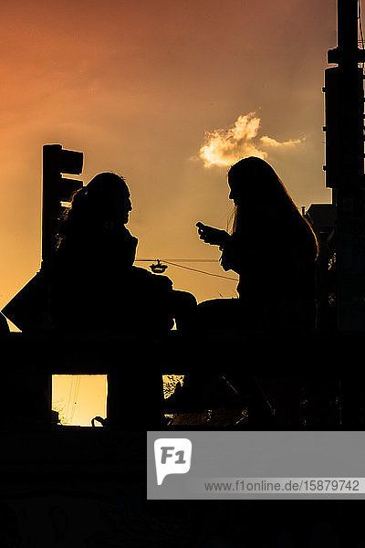 Women sitting outdoors