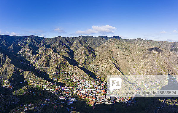 Spain  Province of Santa Cruz de Tenerife  Vallehermoso  Aerial view of town located in hilly valley of La Gomera island