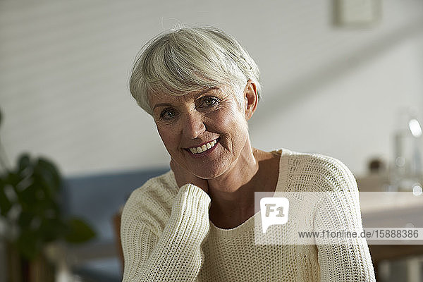 Portrait of senior woman with short grey hair