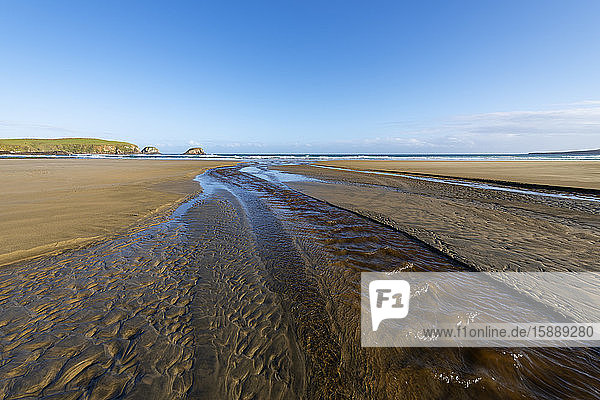 New Zealand  Otago  Coastal water flowing through sand of Tautuku Beach