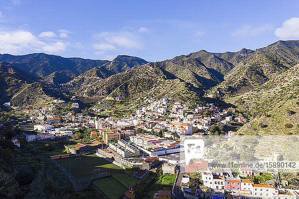 Spain  Province of Santa Cruz de Tenerife  Vallehermoso  Aerial view of town located in hilly valley of La Gomera island