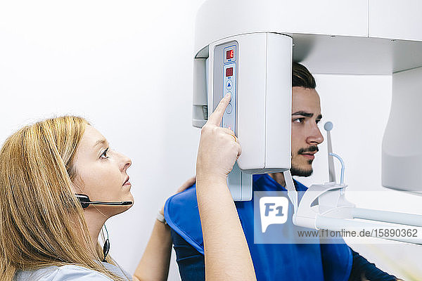 Man in dental clinic getting x-rayed