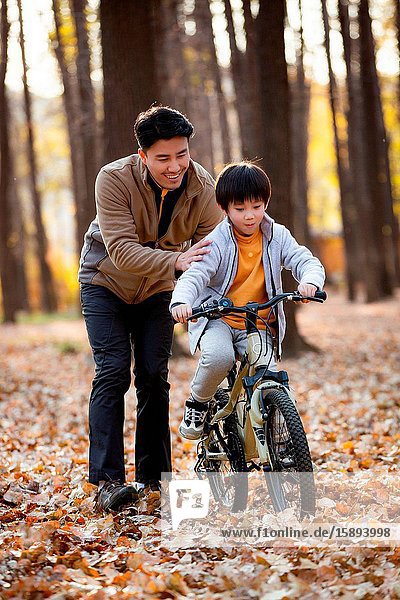 Fall outside his father taught him to ride a bicycle