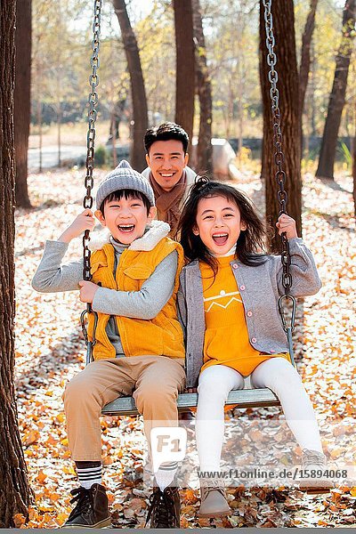 Happy family playing outside