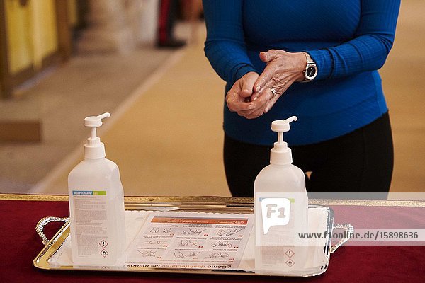 Journalists clean their hands with Hand Sanitizer Gel before 38th edition of the school contest ‘What is a King for you?’ at El Pardo Royal Palace on March 9 2020 in Madrid Spain