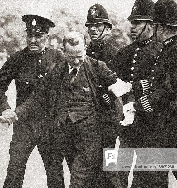 EDITORIAL George McMahon under arrest for producing a revolver with intent to alarm king Edward VIII 1936 he was sentenced to 12 months imprisonment and hard labor. George Andrew Campbell McMahon d. 1970 aka Jerome Bannigan. From The Coronation Souvenir Book published 1937.