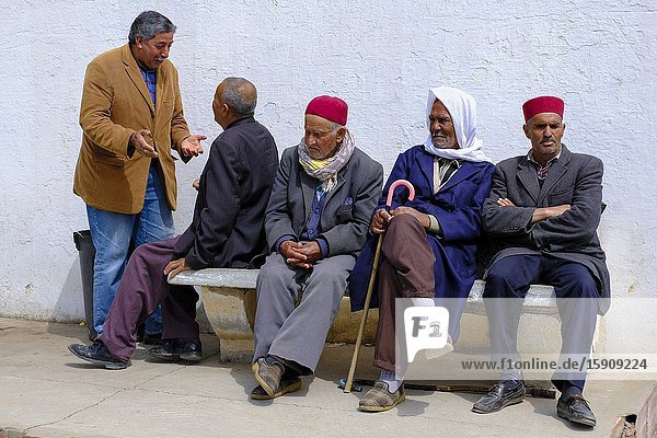 Old men in a street. Tunisia. Africa.
