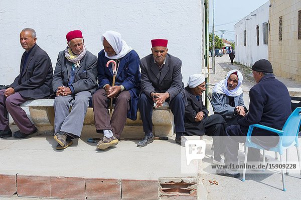 Old men in a street. Tunisia. Africa.