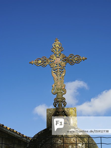 Metal crucifix at Tourtres Lot-et-Garonne Department Nouvelle Aquitaine France.