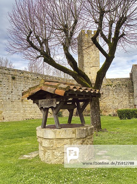 Ancient well of medieval fortified village of Larressingle Gers Department Nouvelle Aquitaine France.