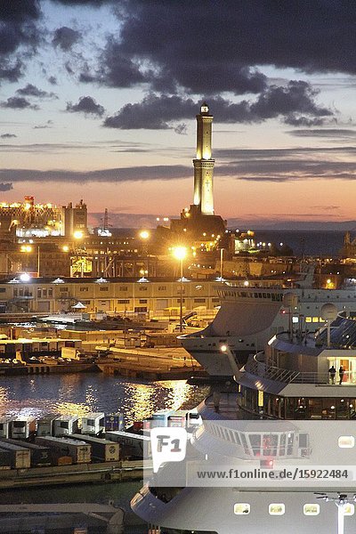 Panorama from a cruise ship of Genoa by dusk harbor Italy.