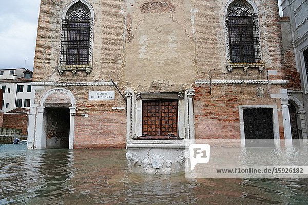 High tide in Venice, the well of the Church of the Abbey of Misericordia, november 2019, Venice, Italy, Europe