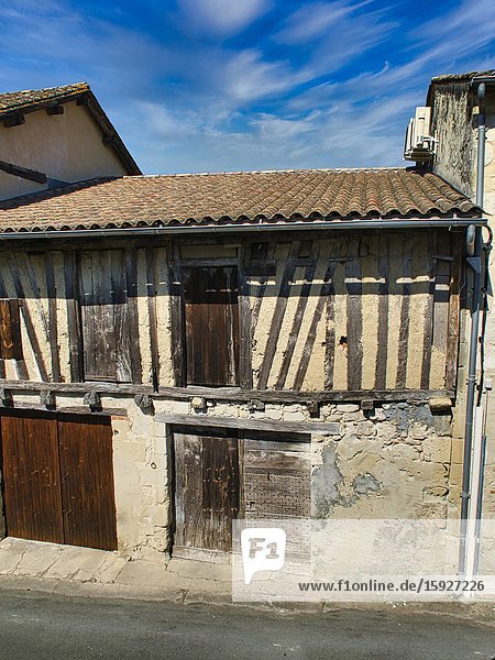 Medieval stone and half-timbered building Lauzun Lot-et-Garonne Department Nouvelle Aquitaine France.