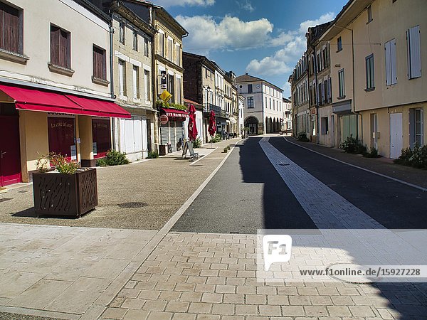 Empty main shopping street during coronavirus lock down Lauzun Lot-et-Garonne Department Nouvelle Aquitaine France.