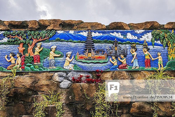 Wooden mural depicting the legend of Ulun Danu Beratan Temple Bali Indonesia.