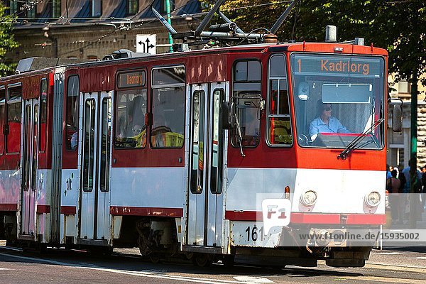 City trams at busy intersection. Tallinn Estonia.