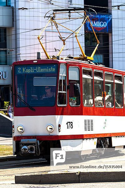 City trams at busy intersection. Tallinn Estonia.